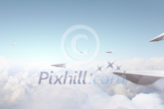 Self-made paper airplanes flying in the sky Self-made paper airplanes flying in the sky
