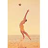 male beach volleyball game player jump on hot sand