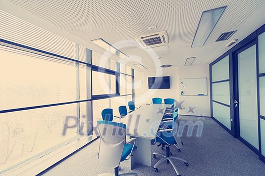 interior of new modern office meeting room with big windows interior of new modern office meeting room with big windows