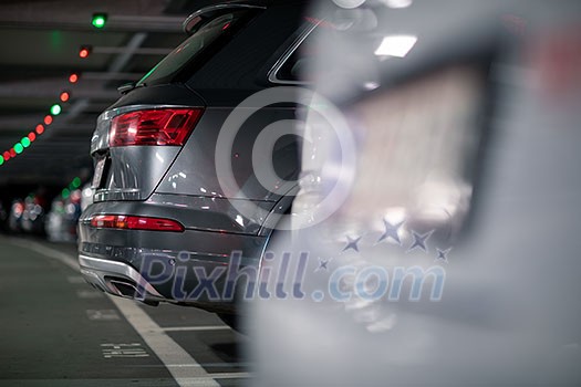 Underground garage or modern car parking with lots of vehicles, perspective Underground garage or modern car parking with lots of vehicles, perspective