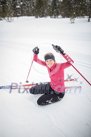 Cross-country skiing: young woman cross-country skiing on a winter day (motion blurred image) Cross-country skiing: young woman cross-country skiing on a winter day (motion blurred image)
