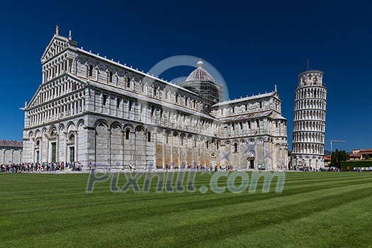 Crowds of tourists visiting the Leaning Tower of Pisa, Tuscany, Italy (motion blur technique used to convey the incessant influx of tourist to this landmark) Crowds of tourists visiting the Leaning Tower of Pisa, Tuscany, Italy (motion blur technique used to convey the incessant influx of tourist to this landmark)