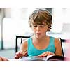 Boy in library with books