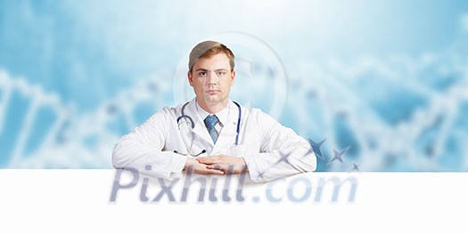 Young doctor with white blank banner. Place for text