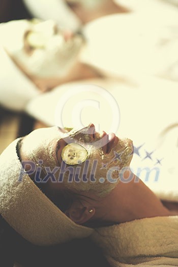 portrait of beautiful woman with cosmetic mask on face in spa and wellness salon portrait of beautiful woman with cosmetic mask on face in spa and wellness salon