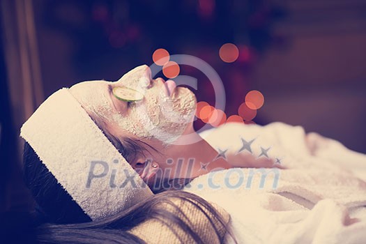 portrait of beautiful woman with cosmetic mask on face in spa and wellness salon portrait of beautiful woman with cosmetic mask on face in spa and wellness salon