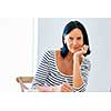 Pretty woman taking notes at home or office