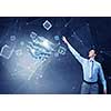 Businessman reaching hand to touch 3D rendering cube figure