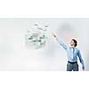 Businessman reaching hand to touch 3D rendering cube figure