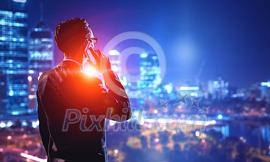 Double exposure of elegant businessman and modern city on white background Double exposure of elegant businessman and modern city on white background