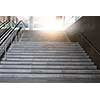 Concrete stairway and escalator in modern office building. Mixed media
