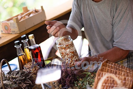 herbalist workshop with bottles and healing herbs herbalist workshop with bottles and healing herbs