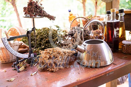 herbalist workshop with bottles and healing herbs herbalist workshop with bottles and healing herbs