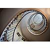 Paris, France - August 05, 2006: Spiral staircase and vintage chandelier in the gallery of Vivienne. Paris