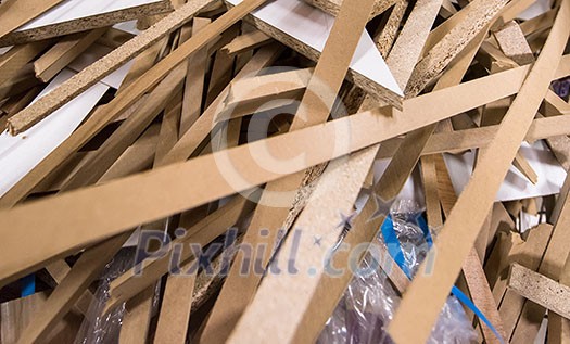 Cut wood pieces remaining from carpenter handcraft at manufacturing company, ready to recycle and reuse process Cut wood pieces remaining from carpenter handcraft at manufacturing company, ready to recycle and reuse process