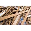 Cut wood pieces remaining from carpenter handcraft at manufacturing company, ready to recycle and reuse process