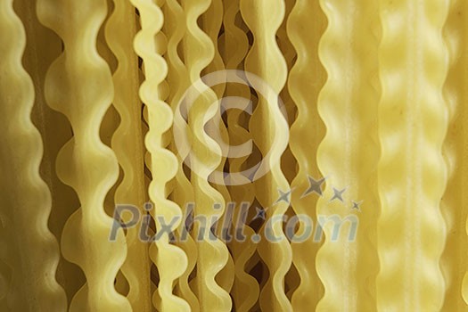 Close of dry spaghetti pasta on table Close of dry spaghetti pasta on table