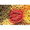 Variety of types and shapes of dry Italian pasta