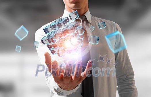 Close of hand holding cube figure as symbol of innovation. 3D rendering Close of hand holding cube figure as symbol of innovation. 3D rendering