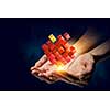 Close of hand holding cube figure as symbol of innovation. 3D rendering
