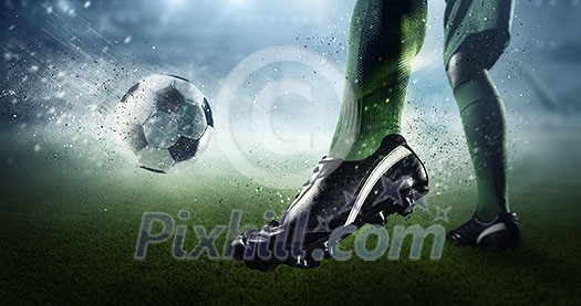 Foot of soccer player kicking ball. Mixed media Foot of soccer player kicking ball. Mixed media