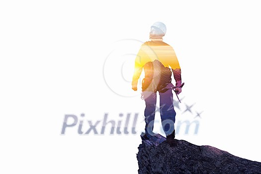 Double exposure of alpinist and mountain landscape. Mixed media Double exposure of alpinist and mountain landscape. Mixed media