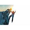 Double exposure of alpinist and mountain landscape. Mixed media