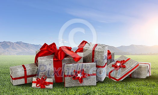 Big pile of Christmas gifts as symbol for coming holiday. Mixed media Big pile of Christmas gifts as symbol for coming holiday. Mixed media