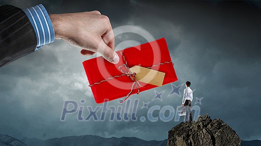 Hand giving red message envelope. Mixed media Hand giving red message envelope. Mixed media