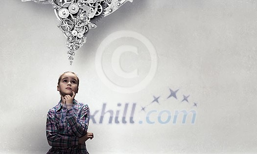 Cute thoughtful girl of school age with hand on chin. Mixed media Cute thoughtful girl of school age with hand on chin. Mixed media