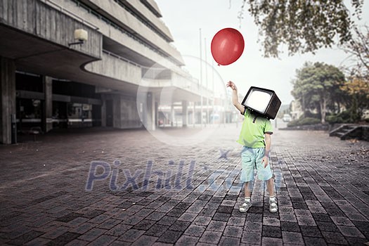 Kid boy with TV monitor for his head. Mixed media Kid boy with TV monitor for his head. Mixed media