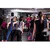 Group of young healthy sporty women exercising with a rubber bands in modern fitness studio  fitness, sport, training, gym and lifestyle concept