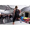 group of young healthy sporty women working out with instructor doing aerobics exercises in a fitness studio fitness, sport, training, gym and lifestyle concept
