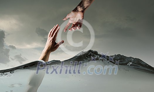 Man drowning in sea and asking for hand of help Man drowning in sea and asking for hand of help