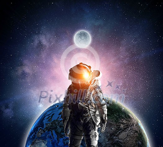 Space explorer in astronaut suit. Mixed media. Elements of this image are furnished by NASA Space explorer in astronaut suit. Mixed media. Elements of this image are furnished by NASA