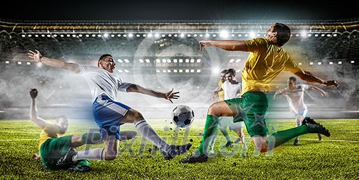 Soccer players at sport stadium fighting for ball . Mixed media Soccer players at sport stadium fighting for ball . Mixed media
