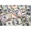 A lot of dollar banknotes and old key