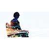 Double exposure of businesswoman in chair and modern city on white background