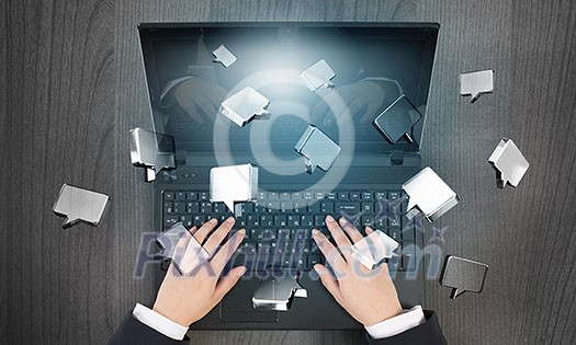 Top view of businesswoman working on laptop and social communication icons Top view of businesswoman working on laptop and social communication icons