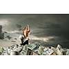 Rich businessman sink in pile of money banknotes