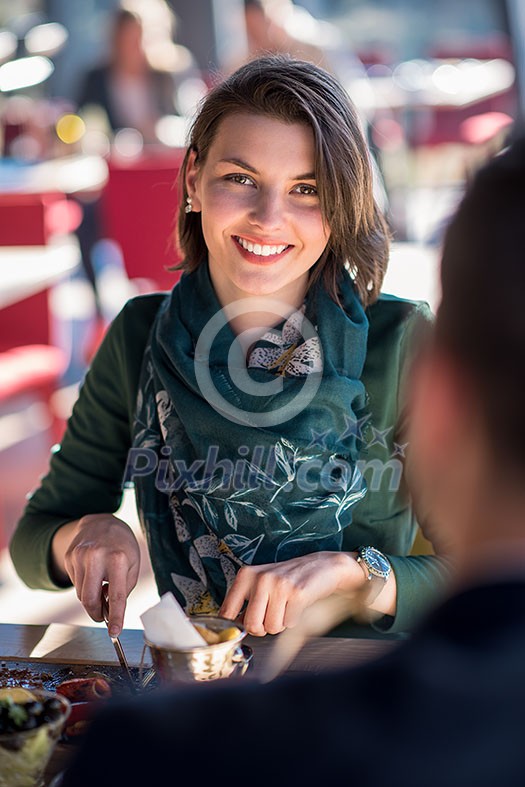 happy smiling loving couple enjoying free time looking eachother while having lunch at luxury restaurant happy smiling loving couple enjoying free time looking eachother while having lunch at luxury restaurant