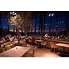 People enjoy in the lovely evening at a luxury restaurant