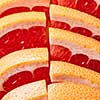 Composition of juicy slices of ripe grapefruit. Healthy Organic Fruit. Flat lay