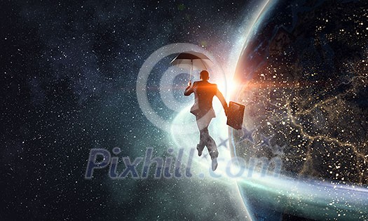 Cheerful businessman with umbrella and his suitcase running on globe. Elements of this image are furnished by NASA Cheerful businessman with umbrella and his suitcase running on globe. Elements of this image are furnished by NASA