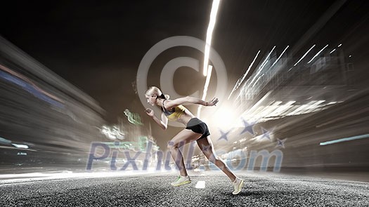 Slim attractive sportswoman running fast. Mixed media Slim attractive sportswoman running fast. Mixed media