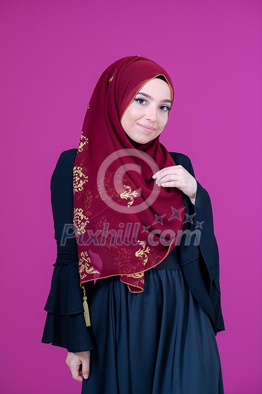 beautiful muslim woman in fashinable dress with hijab isolated on modern plastic pink background representing modern islam fashion and ramadan kareem concept beautiful muslim woman in fashinable dress with hijab isolated on modern plastic pink background representing modern islam fashion and ramadan kareem concept