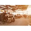 software developers working everyday job writing programming code at modern sunny bright open plan office