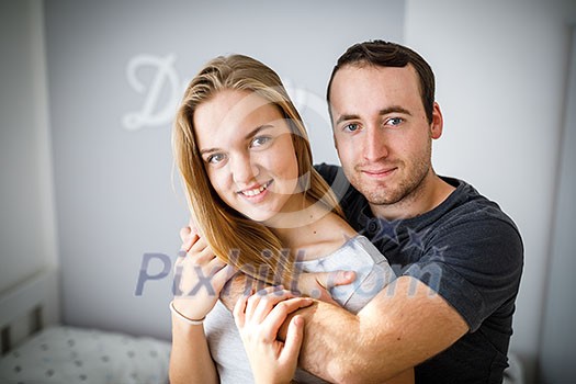 Brother and sister posing for a photo together. Hugging and smiling, feeling caring and loved. Brother and sister posing for a photo together. Hugging and smiling, feeling caring and loved.