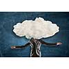 Unrecognizable businesswoman with white cloud instead of her head. Mixed media