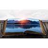 Book with natural sea landscape on pages